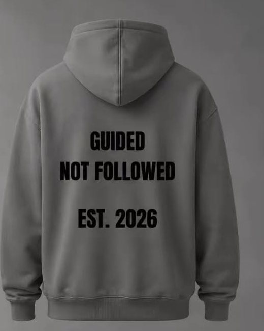 Back of the Guided Not Followed hoodie, with GUIDED NOT FOLLOWED and EST. 2026 in black type